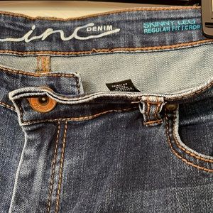 Inc Denim skinny leg regular fit crops in a medium washed finish